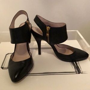 Vince Camuto black pumps with zippers